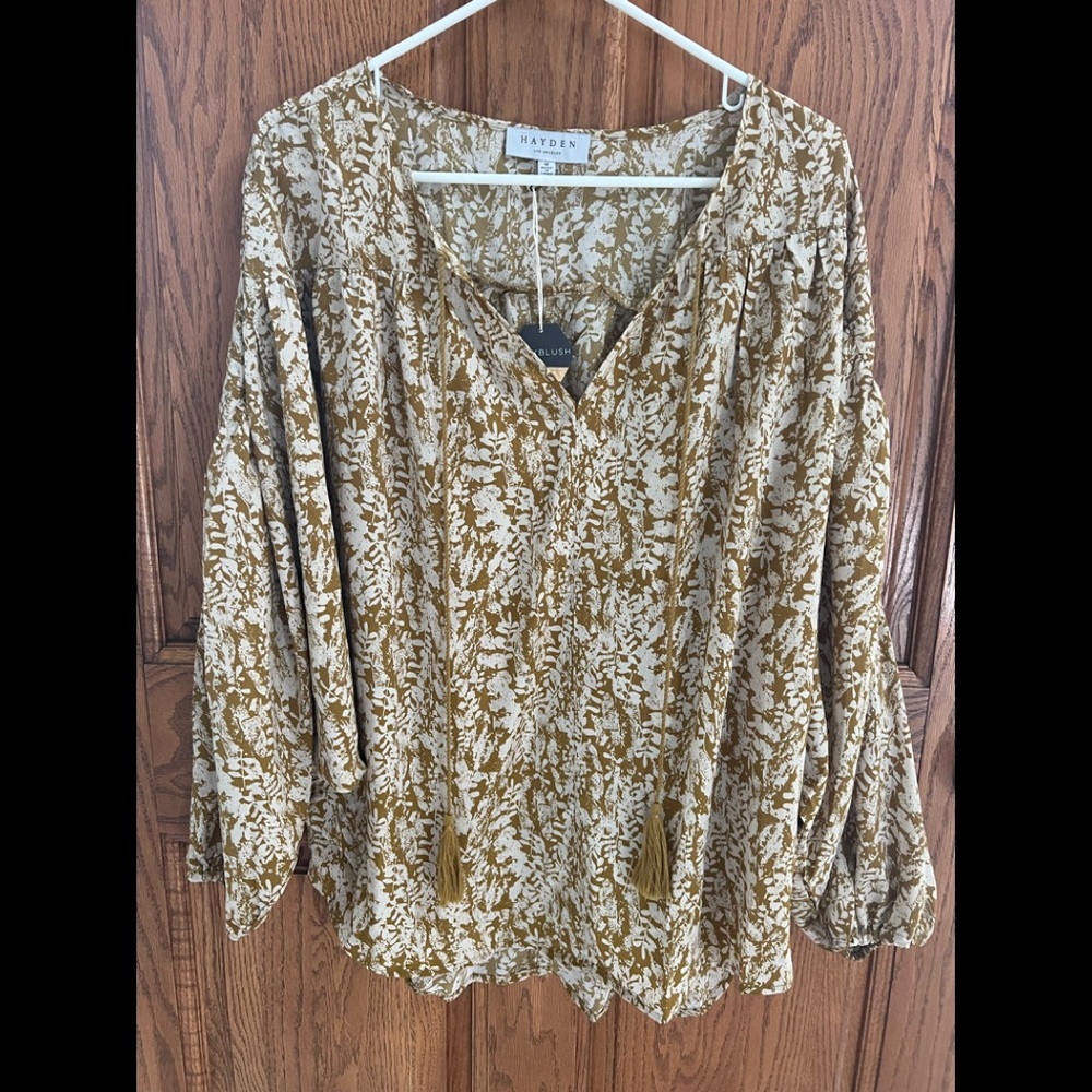 Dolman sleeves. Gorgeous top. New never worn.